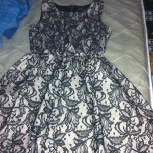A dress with black lace, no back shown