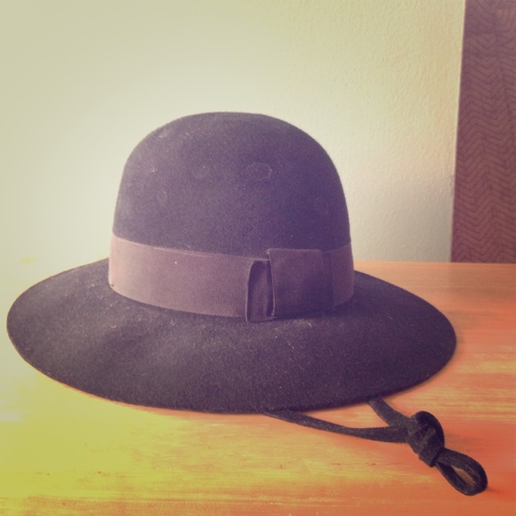 Black felt hat with chin strap.