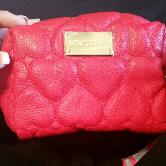 Betsey johnson makeup bag.