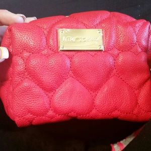 Betsey johnson makeup bag.