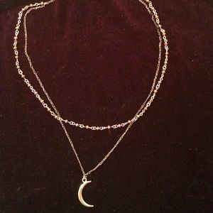 Half moon Urban Outfitters necklace.