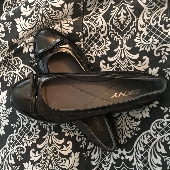 Shiny black DKNY flats