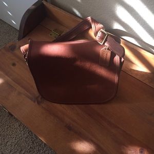 Brown leather coach handbag