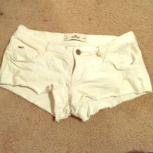 White distressed shorts