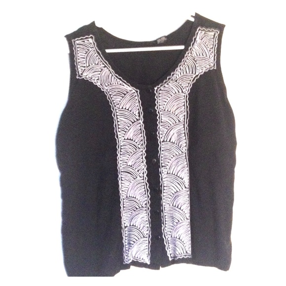 Black top with white embroidery. - Picture 1 of 3