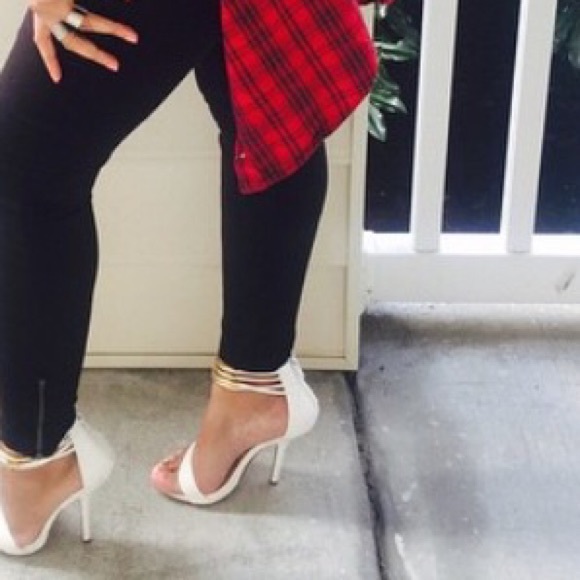 White and gold pumps