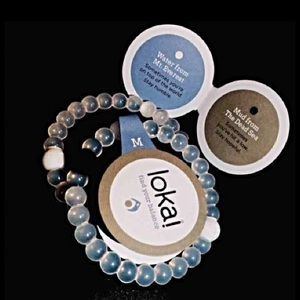 2 Lokai bracelets size s in blue and clear