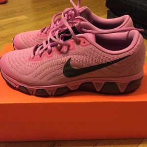 All pink and black Women's Nike running shoes.