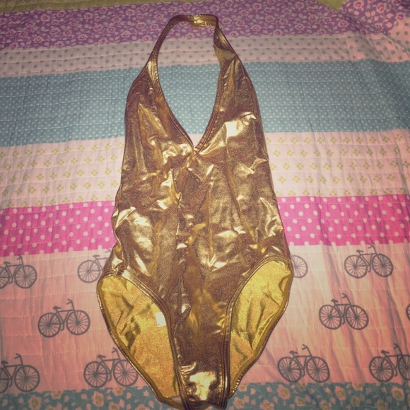Gold open backed leotard