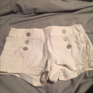 White high wasted button shorts