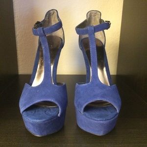 Carlos Santana t-strap heels.
