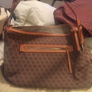 Dooney and Bourke beige leather trim