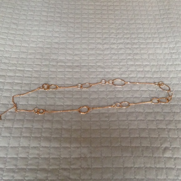 Gold toned long necklace