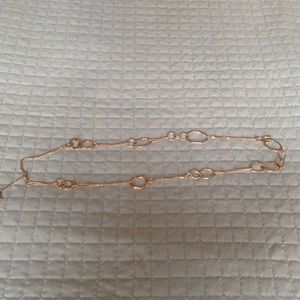 Gold toned long necklace