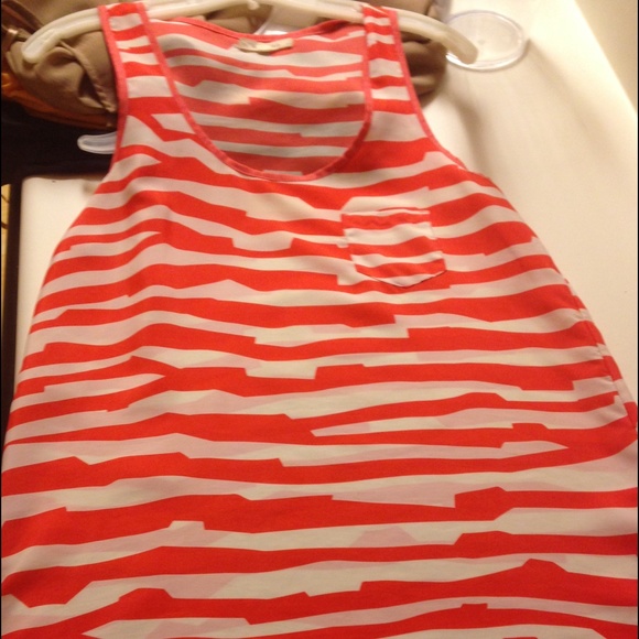 Orange and white strip tank