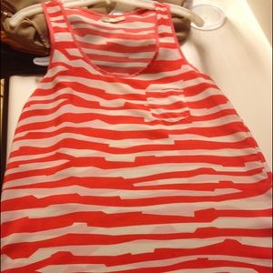 Orange and white strip tank