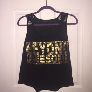 I'm selling a loose muscle tank top.