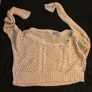 A crop top knit sweater