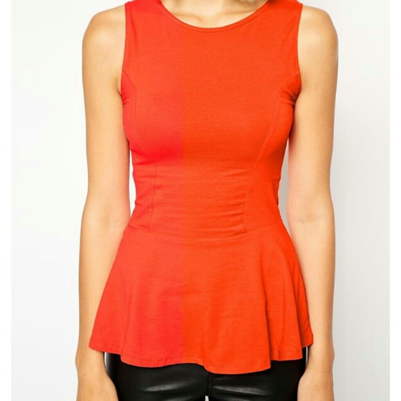 Bright orange/red peplum top