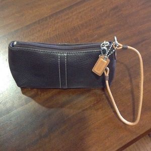 Brown leather coach wristlet