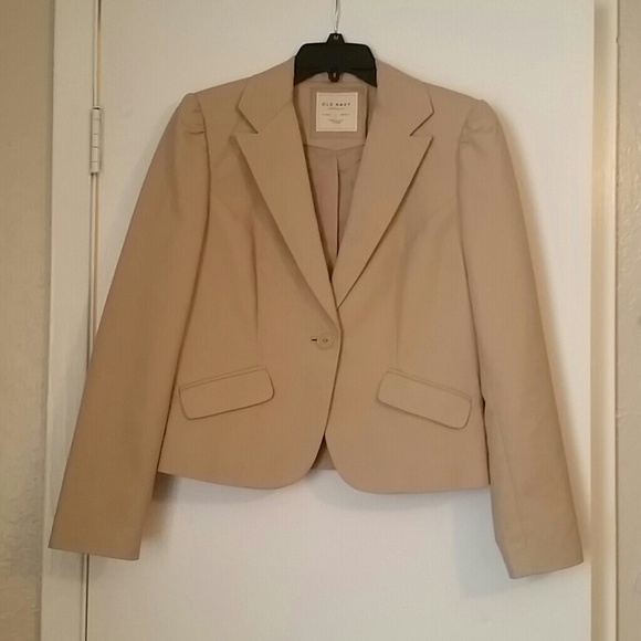 Tan skirt suit.