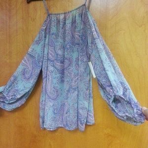 Blouse never use. Beautiful colors.