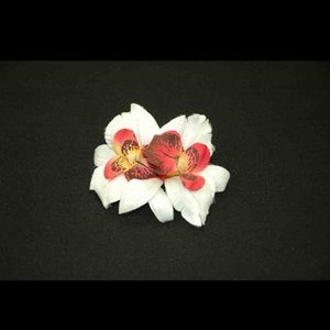 White floral hair clip.