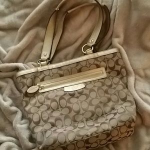 Gold and brown handbag