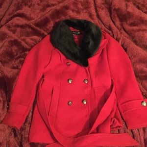 Elegant red coat with faux fur