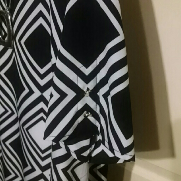 BIG  SALE NWT. "LILY" ADORABLE FLIRTY DRESS - Picture 2 of 3