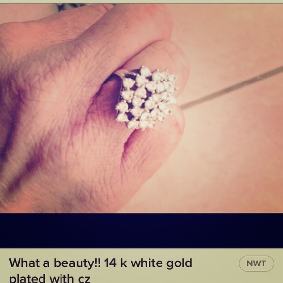 What a beauty!! 14 k white gold plated with cz