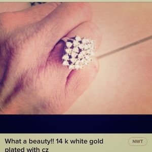 What a beauty!! 14 k white gold plated with cz