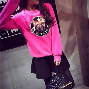 Pink graphic sweatshirt.