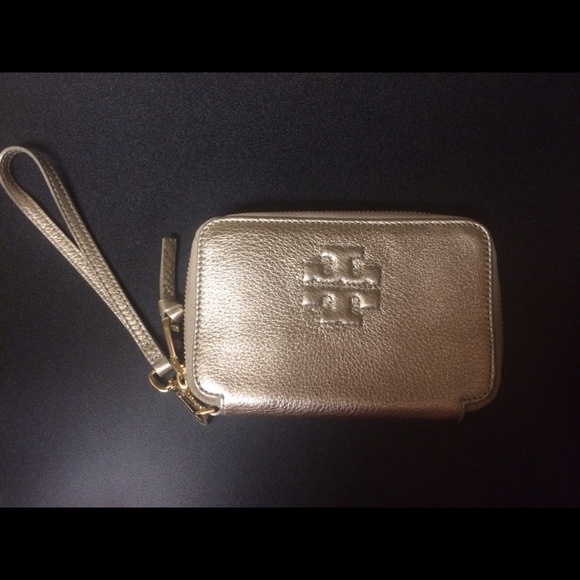Authentic Tory Burch light gold wristlet