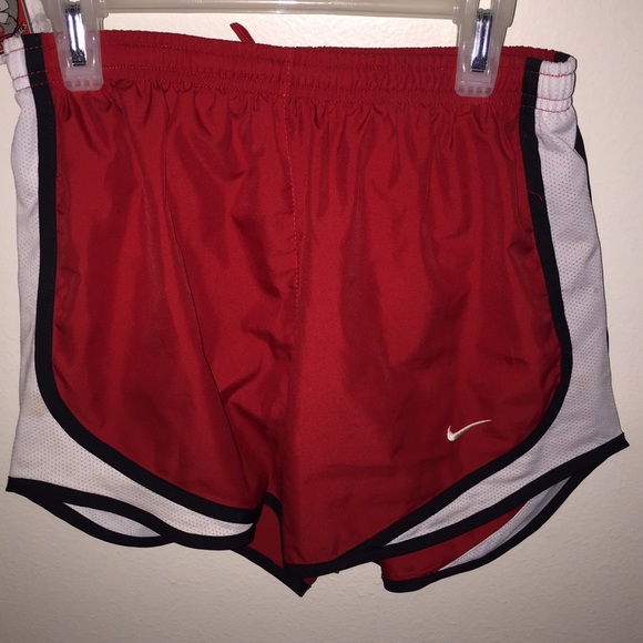 Red Nike athletic shorts