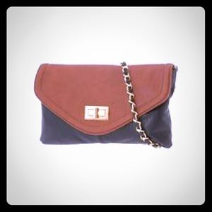 Reduced black & brown Aldo clutch