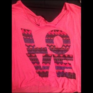 Loose fitting Rue 21 opened back shirt