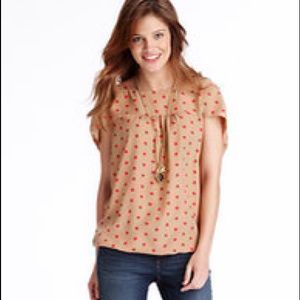 Tan polka dotted blouse