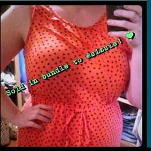 **Sold**orange dress with black polka dots