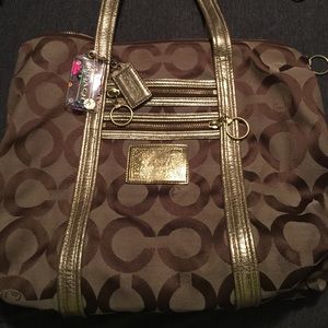 Tan and gold coach bag