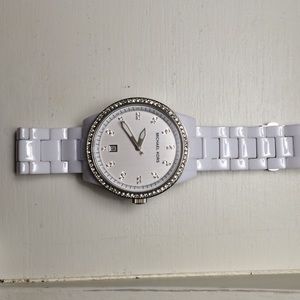 White Michael Kors watch.