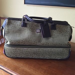 Rolling duffle bag/zippered bottom for shoes etc.
