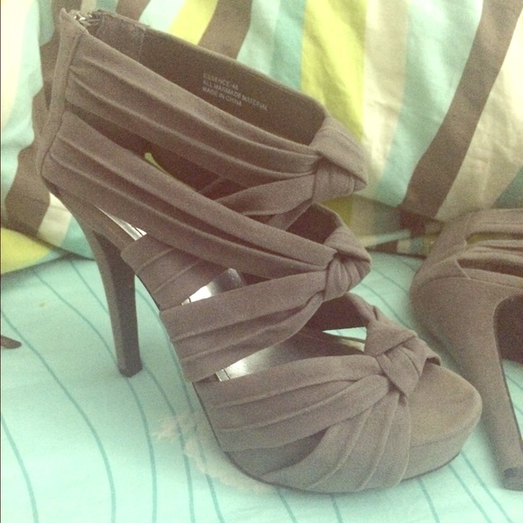 Grey open toed heels.