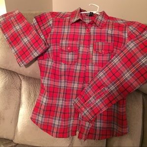 Plaid button down shirt.