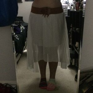 White pleated high-low skirt