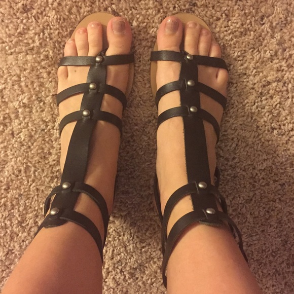 Black leather gladiator sandals