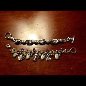 2 silver style bracelets barely worn.