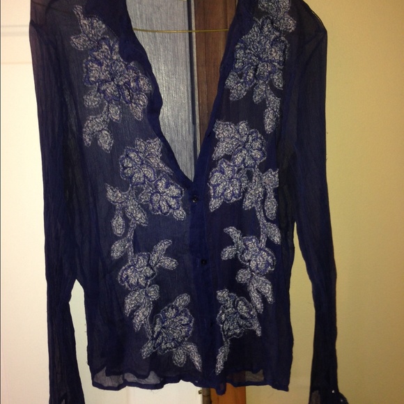 Beautiful navy and floral sheer blouse.