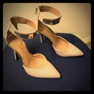 A pair of Fergie nude heels