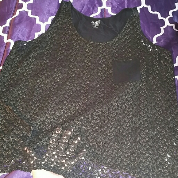 Sold lack and gold tank.